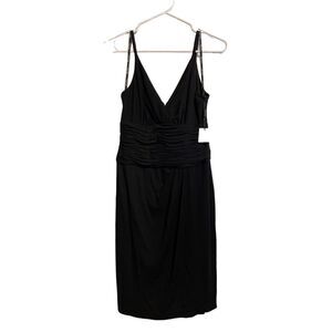 Calvin Klein NWT Black spaghetti strapped dress.‎ Size 4. Perfect party dress.